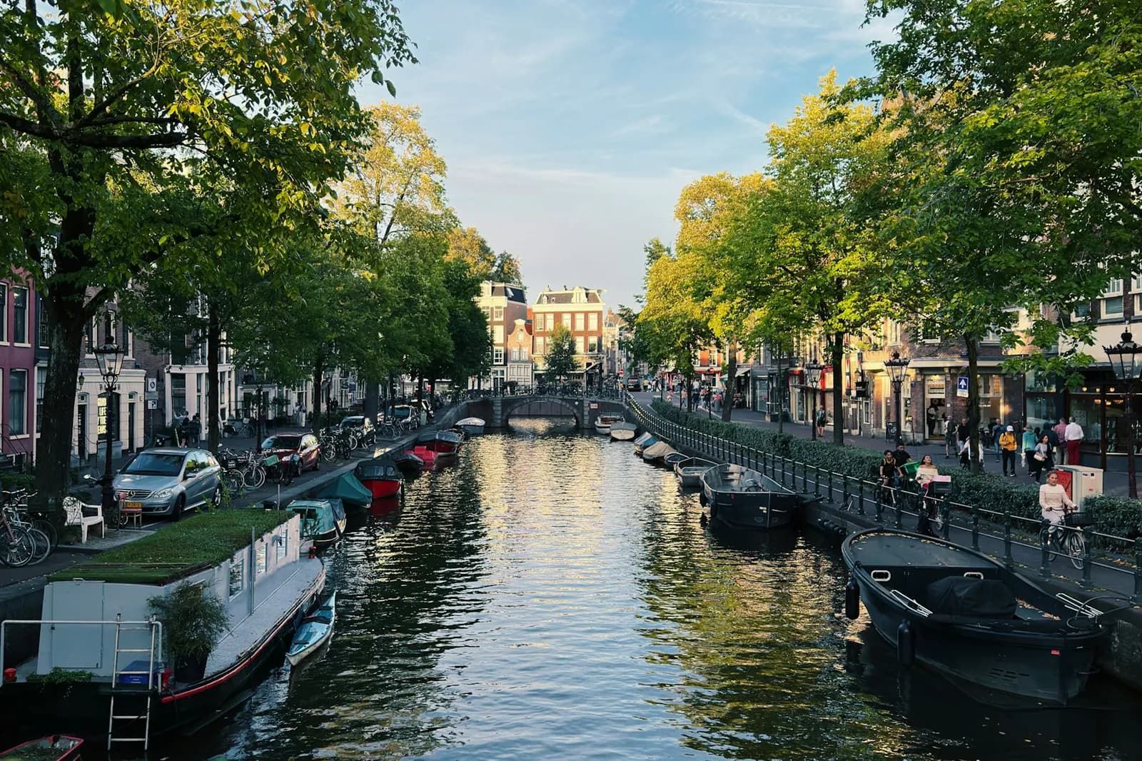 Warm canal-side Dutch neighborhood for the final call to action